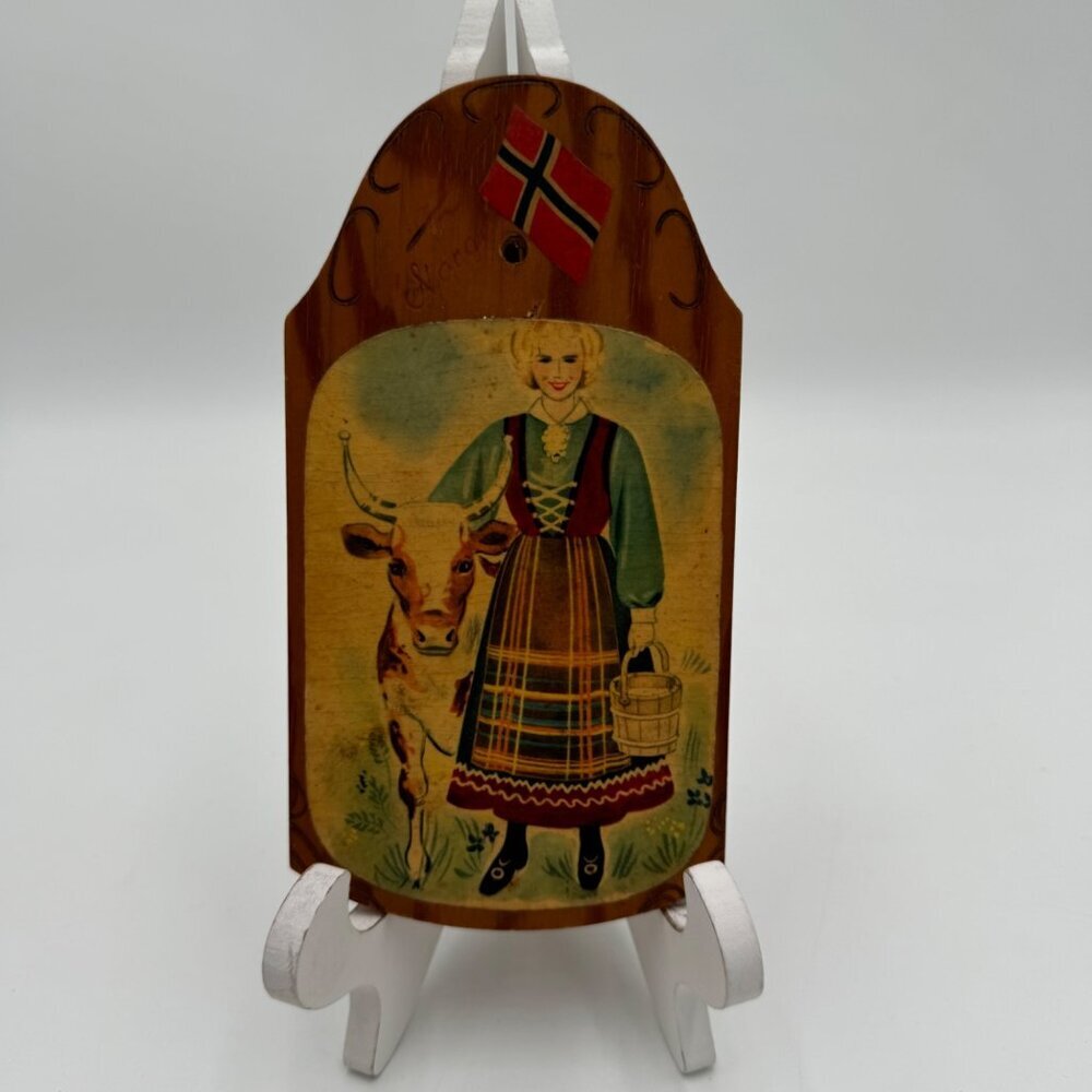 Norwegian wood souvenir plaque girl with adorable cow 1950s wall decor kitsch